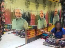 PM મોદીની પ્રિન્ટવાળી સાડી તૈયાર કરવાનું ગુજરાતના વેપારીને ભારે પડ્યું? જાણો કેમ