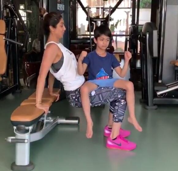 Bollywood actress Shilpa Shetty workout goals with son video શિલ્પા શેટ્ટીએ પુત્રને ખોળામાં બેસાડી કર્યું જિમમાં વર્ક આઉટ, વીડિયો થયો વાયરલ