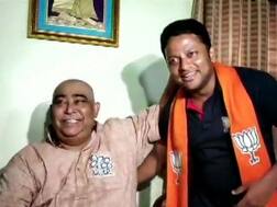 બીજેપી ઉમેદવાર ટીએમસી નેતાના પગે લાગ્યા, મુલાકાતથી બંગાળમાં અટકળો શરૂ