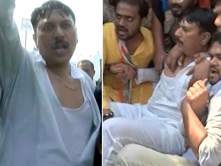 Gujarat Congress president Amit Chavda among detained for taking out rally without permission  ગુજરાત કોંગ્રેસના પ્રમુખ અમિત ચાવડાની પોલીસે કરી ટીંગાટોળી, ખેંચતાણ થતાં અમિત ચાવડાનો ઝભ્ભો ફાટ્યો