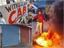 દેશભરમાં નાગરિકતા સંશોધન બિલનો વિરોધ, આગચંપી-પથ્થરમારો, દુકાનો બંધ કરાવીને રસ્તાં પર ઉતર્યા લોકો, જુઓ તસવીરો