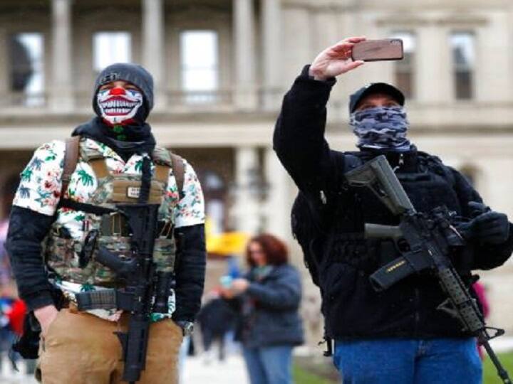 Trump tweets support for anti-lockdown protests  અમેરિકામાં લોકડાઉન વિરુદ્ધ વ્યાપક પ્રમાણમાં પ્રદર્શન, રાઇફલ લઇને નીકળ્યા યુવાઓ