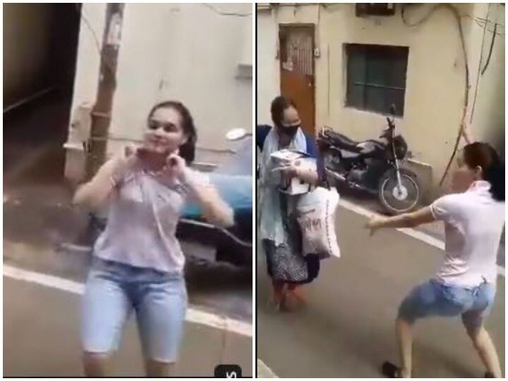 viral video sister welcomes woman who returned after beating corona banged on the road Viral Video: કોરોનાને હરાવીને પરત ફરેલ મહિલાનું બહેને કર્યું શાનદાર સ્વાગત, રસ્તા પર કર્યો ધમાકેદાર ડાન્સ