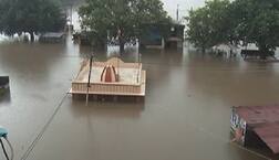 સુરતઃ આ ગામમાં જ્યાં જુઓ ત્યાં પાણી જ પાણી, છેલ્લા પાંચ દિવસથી મંદિર પાણીમાં ગરકાવ; જુઓ તબાહી મચાવનારા દ્રશ્યો