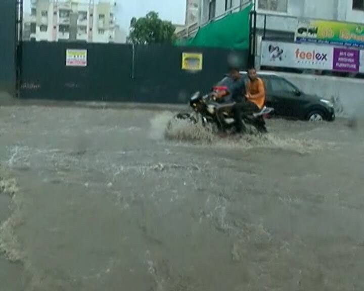 અમદાવાદમાં છેલ્લા 24 કલાકમાં 1.98 ઈંચ વરસાદ , અનેક વિસ્તારોમાં ભરાયા પાણી Ahmedabad received Approx 1 98 inches of rain in the last 24 hours અમદાવાદમાં છેલ્લા 24 કલાકમાં 1.98 ઈંચ વરસાદ , અનેક વિસ્તારોમાં ભરાયા પાણી