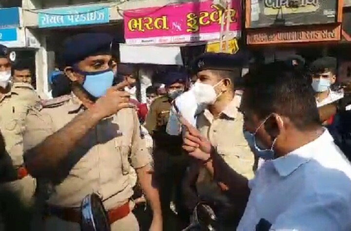 Congress Leader Paresh Dhanani scuffle with police due to detained by police  અમરેલીઃ 'મિસ્ટર ચૌધરી ! હાથ અડાડતા નહીં, મને કોરોના થયો તો હું તમારી.......'