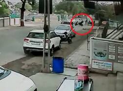 રાજકોટઃ કારે એક્ટિવા પર આવી રહેલા બે લોકોને હવામાં ફંગોળ્યા, ટક્કર મારી કાર ભગાડી મૂકી, જુઓ LIVE PHOTOS