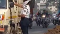 સુરતમાં મહિલા TRB જવાનનો વીડિયો વાયરલ, ટેમ્પો ચાલક પાસેથી હપ્તો લીધો હોવાનો આક્ષેપ