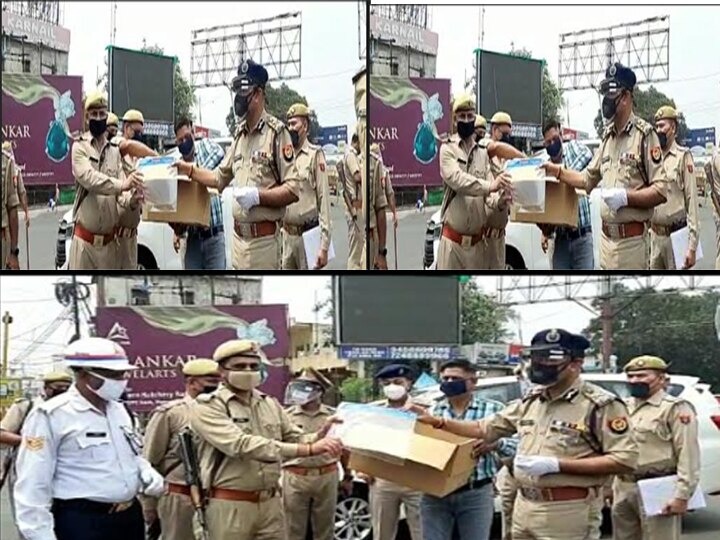In Meerut face shield distributed to more than 200 policemen to prevent himself from coronavirus Meerut: कोरोना के साये में पुलिसकर्मी, जिले में 200 से ज्यादा पुलिसकर्मियों को बांटे गए फेस शील्ड
