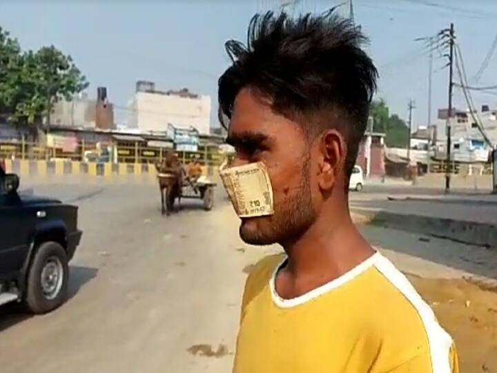 Seeing Meerut Police bike rider made mask of 10 rupee note Meerut: सामने नजर आई पुलिस तो बाइक सवार युवक ने 10 रुपये के नोट को बना लिया मास्क